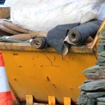 journey after collecting rubbish in skip bin