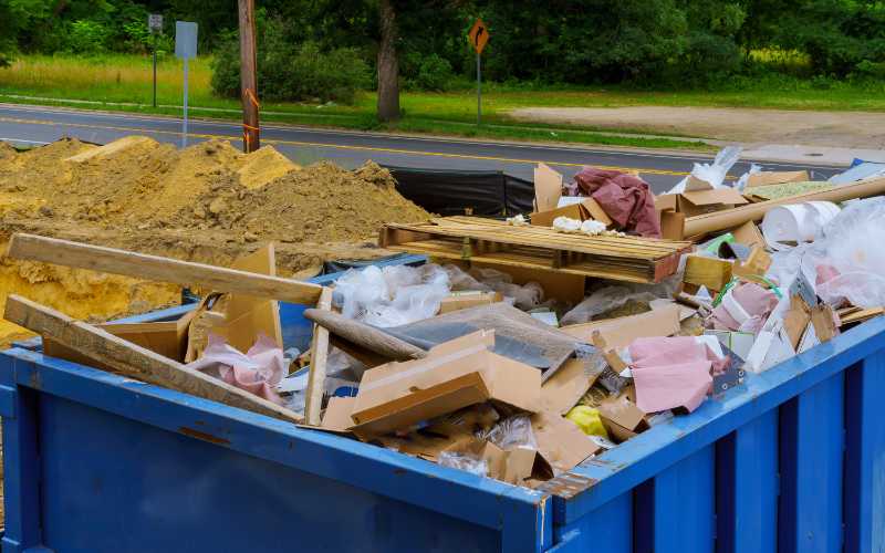 moving skip bin waste